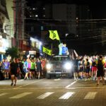 Participantes correndo no evento Dia do Corre em Campo Grande.