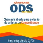 Mulher artista pintando mural sobre ODS nos Muros em Campo Grande